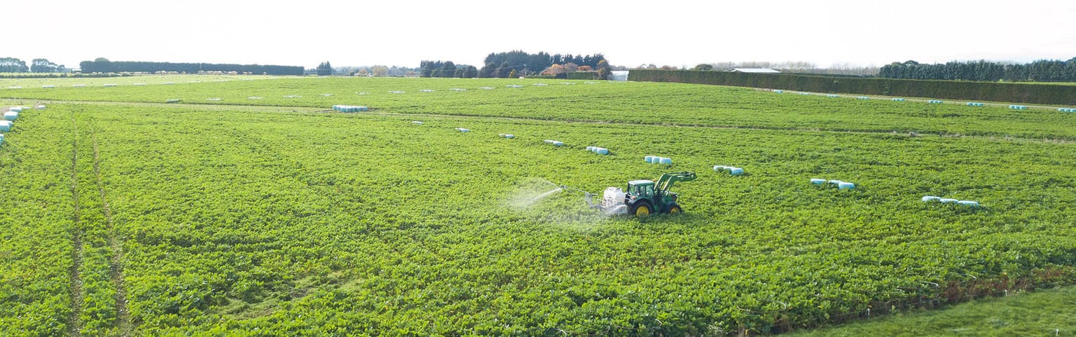 Image of tow and fert spraying over wintering block
